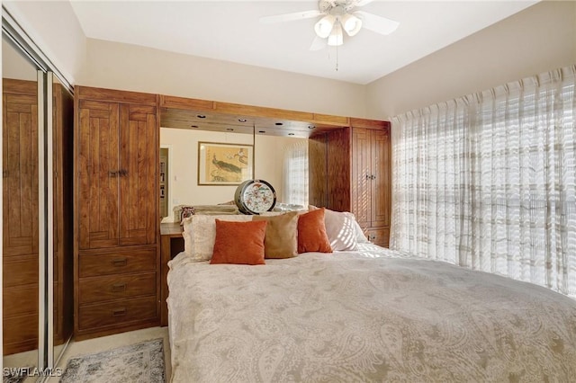 bedroom featuring a closet and ceiling fan