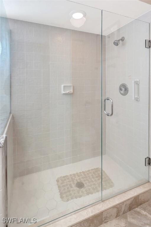 full bath featuring a stall shower