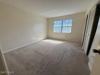 unfurnished bedroom with carpet floors