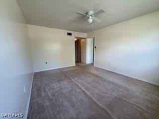 carpeted empty room with ceiling fan