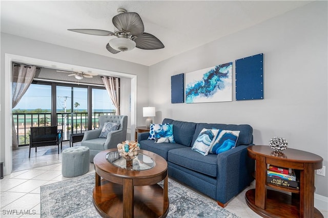 tiled living room with ceiling fan