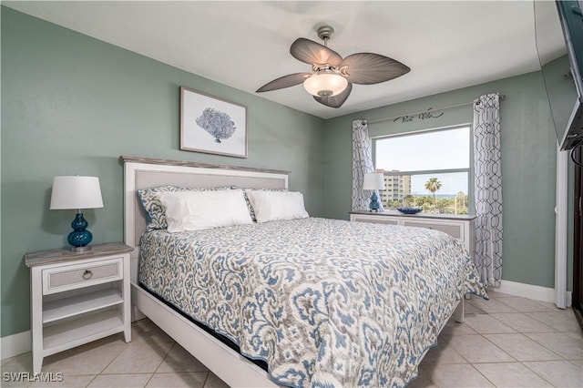 bedroom with light tile patterned floors and ceiling fan