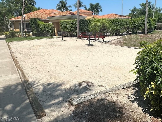 surrounding community featuring volleyball court