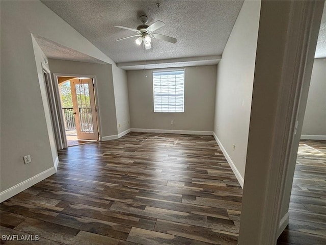 unfurnished room with baseboards, dark wood-style floors, lofted ceiling, and ceiling fan