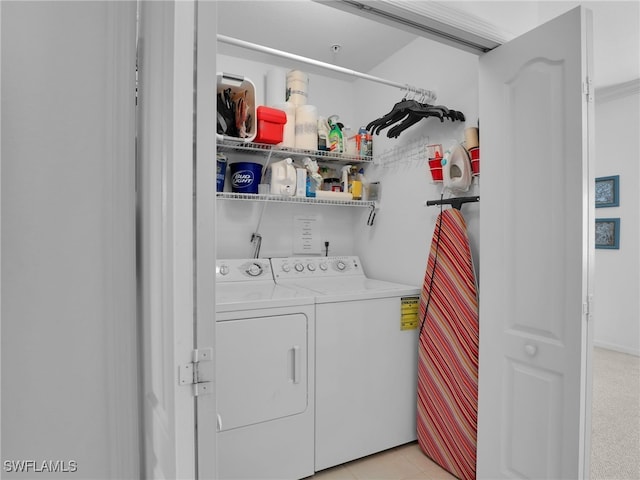 laundry room with washing machine and dryer