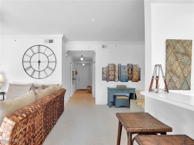 interior space featuring ornamental molding and light carpet