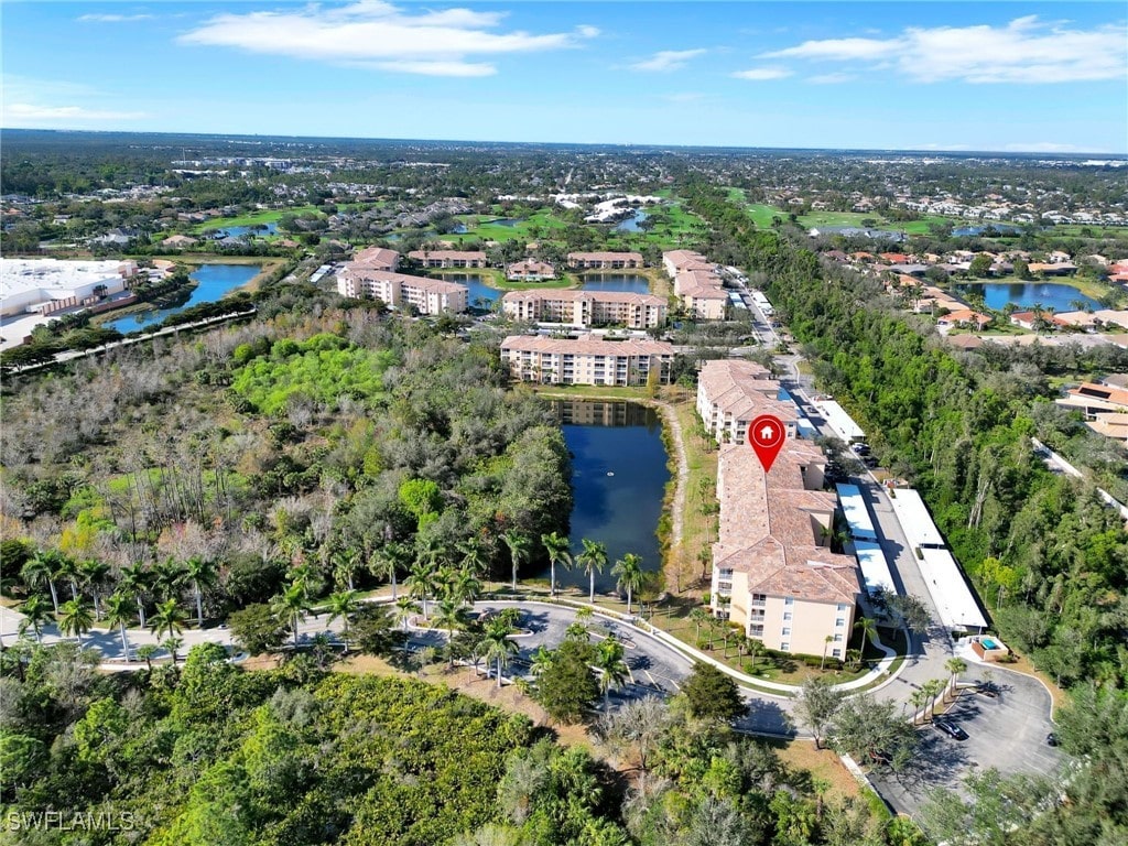 bird's eye view with a water view