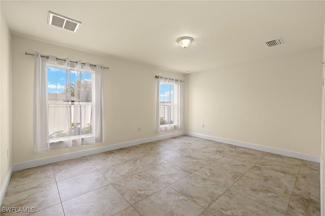 view of tiled empty room