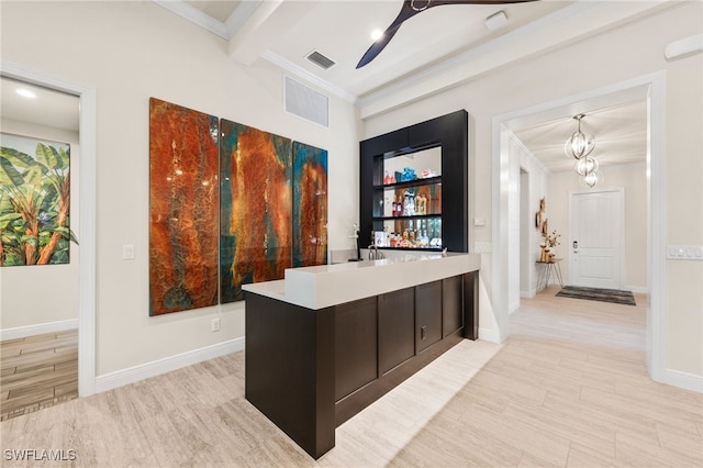 8949 Mustique Ln, Naples, FL 34114 - bar featuring crown molding, light wood-style flooring, a chandelier, beamed ceiling, and ceiling fan
