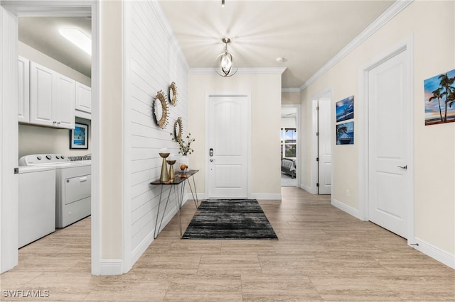 8949 Mustique Ln, Naples, FL 34114 - foyer entrance featuring washing machine and dryer and crown molding