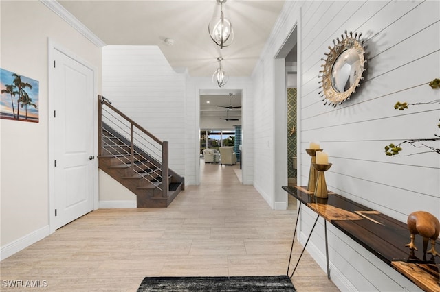 8949 Mustique Ln, Naples, FL 34114 - foyer with ornamental molding and stairs