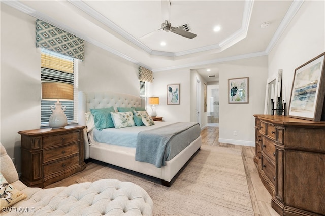 8949 Mustique Ln, Naples, FL 34114 - bedroom featuring light wood-style flooring, a raised ceiling, ornamental molding, recessed lighting, and a ceiling fan