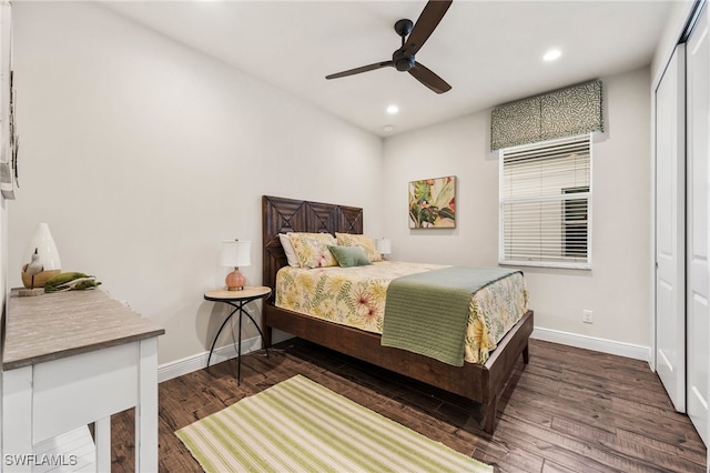 8949 Mustique Ln, Naples, FL 34114 - bedroom with recessed lighting, wood finished floors, a ceiling fan, and a closet