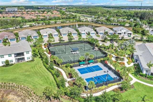8949 Mustique Ln, Naples, FL 34114 - aerial perspective of suburban area with a large body of water
