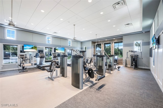 8949 Mustique Ln, Naples, FL 34114 - exercise room featuring carpet floors and recessed lighting