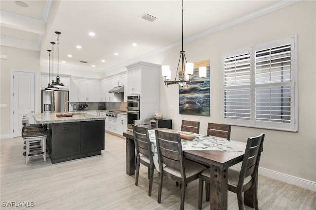 8949 Mustique Ln, Naples, FL 34114 - dining area featuring a chandelier, crown molding, recessed lighting, and light wood-type flooring