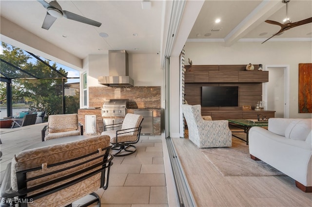 8949 Mustique Ln, Naples, FL 34114 - living room featuring a ceiling fan and ornamental molding