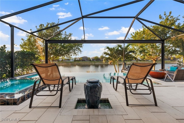 8949 Mustique Ln, Naples, FL 34114 - view of patio / terrace with an in-ground hot tub, a water view, and a lanai