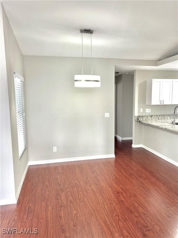 interior space with dark hardwood / wood-style flooring