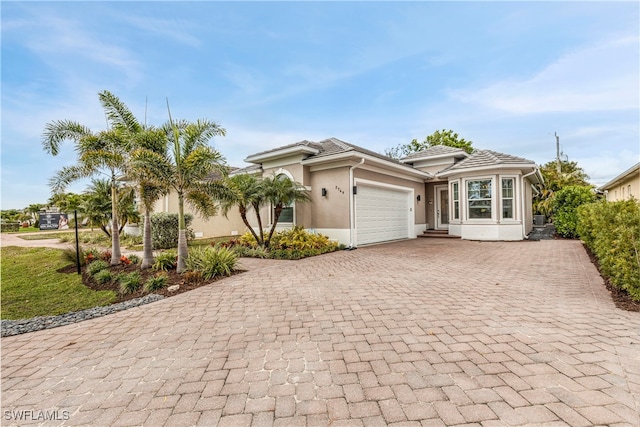 view of front of home with a garage