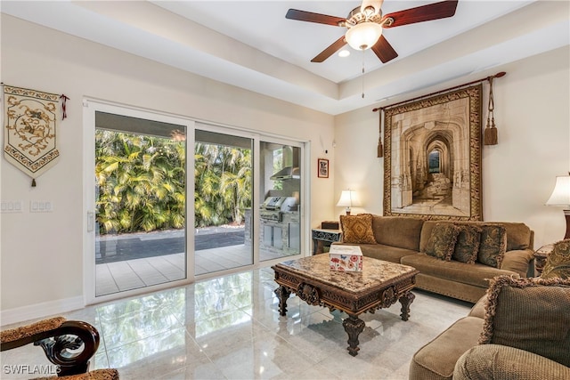 living room with a ceiling fan