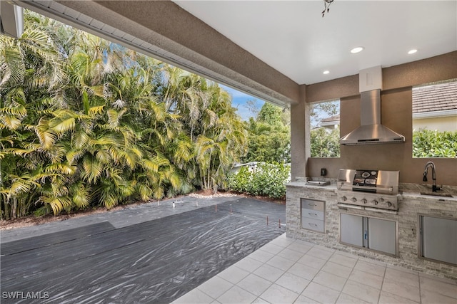 view of patio / terrace featuring grilling area, an outdoor kitchen, and a sink