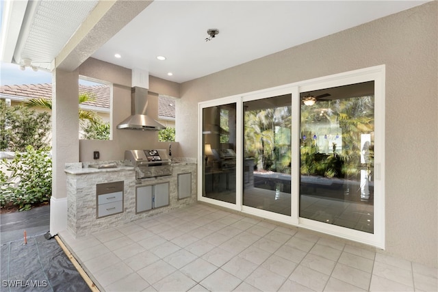 view of patio / terrace with area for grilling and a grill