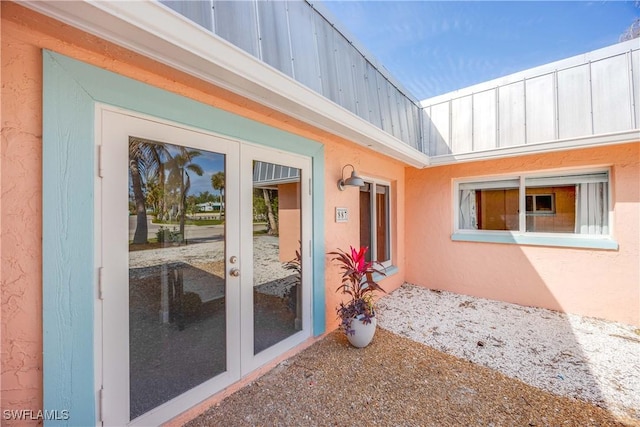 doorway to property featuring french doors