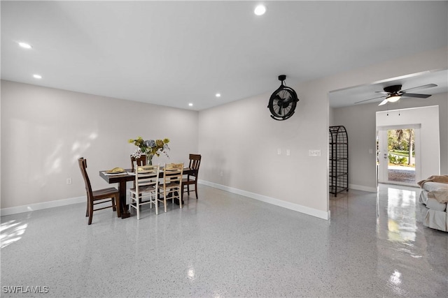 dining space featuring ceiling fan