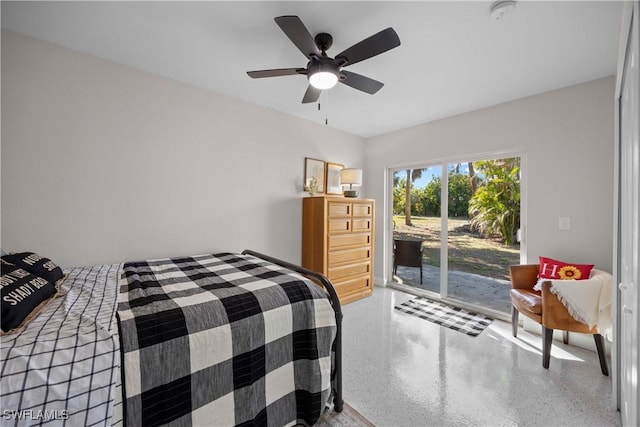 bedroom with access to exterior and ceiling fan