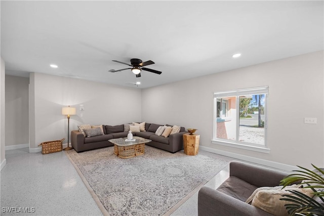 living room featuring ceiling fan