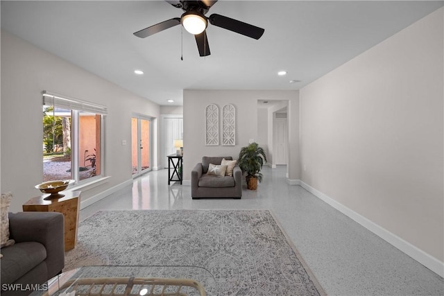 living room featuring ceiling fan