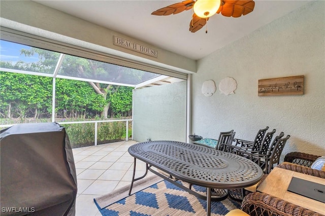 sunroom / solarium with ceiling fan