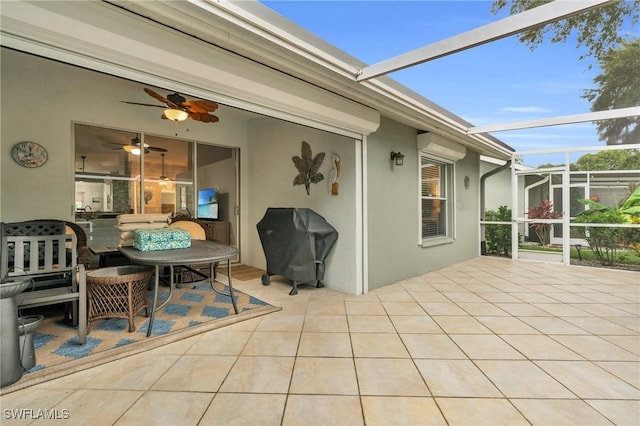 view of patio / terrace featuring a lanai and a grill