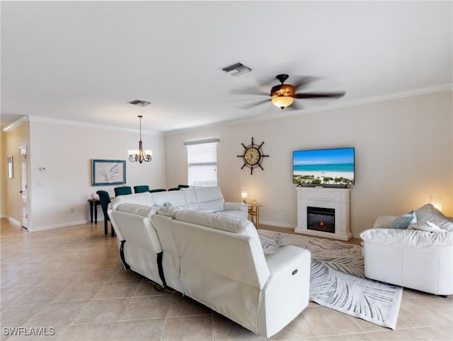 tiled living room with crown molding and ceiling fan with notable chandelier