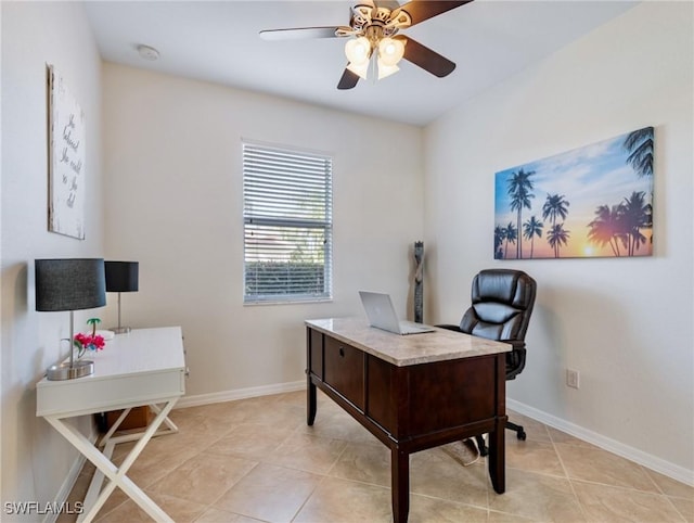 tiled office featuring ceiling fan