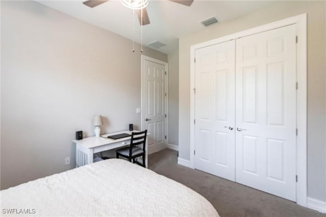 carpeted bedroom with a closet and ceiling fan