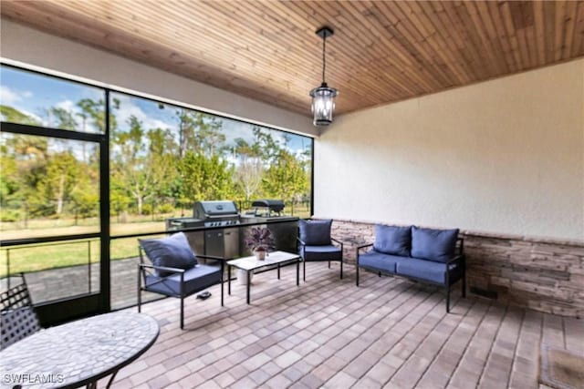 sunroom with wooden ceiling