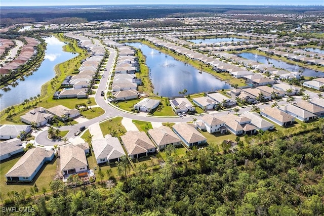 drone / aerial view with a water view