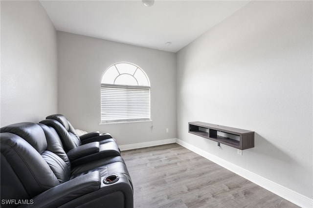 living room with light hardwood / wood-style flooring