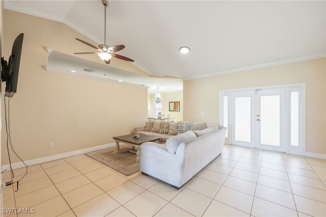 living room featuring crown molding, vaulted ceiling, and light tile patterned floors