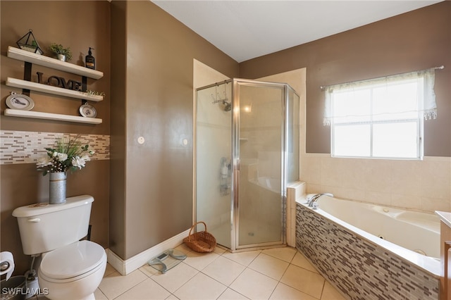 bathroom with toilet, shower with separate bathtub, and tile patterned flooring