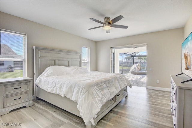 bedroom with ceiling fan, light wood-type flooring, and access to outside