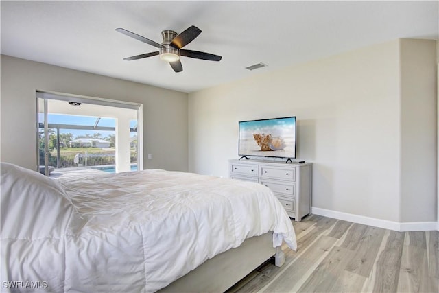 bedroom with access to exterior, light hardwood / wood-style floors, and ceiling fan