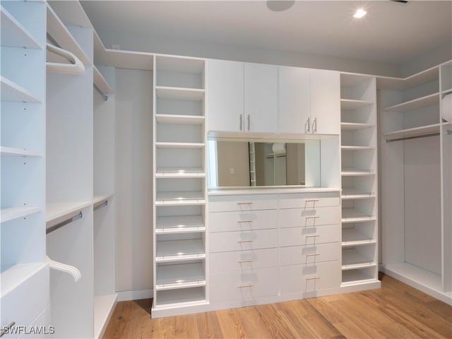 walk in closet featuring light wood-type flooring