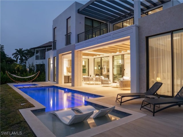 view of pool featuring an outdoor hangout area and a patio