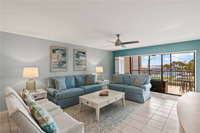 tiled living room with ceiling fan