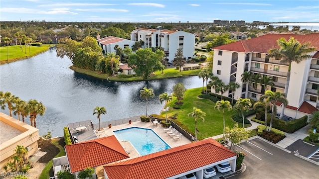 birds eye view of property featuring a water view