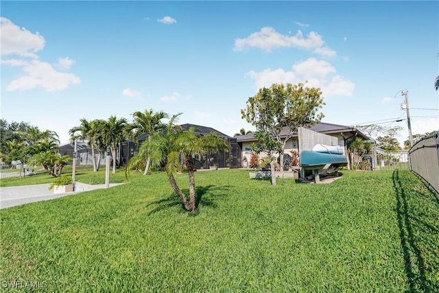 view of yard featuring fence