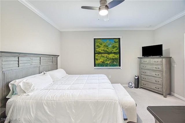 bedroom with a ceiling fan, light colored carpet, crown molding, and baseboards